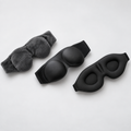 Masque de sommeil lesté 3D avec cache-oreilles, posé à plat